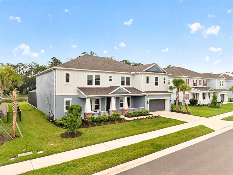 Front exterior of a new home in , Wesley Chapel, FL, highlighting curb appeal (Image 20). Front exterior of a new home in , Wesley Chapel, FL, highlighting curb appeal (Image 20).