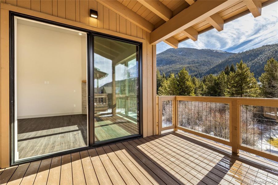 Deck off of the living area with views of Keystone Ski Resort and open space. This deck is set up to accomodate a hot tub