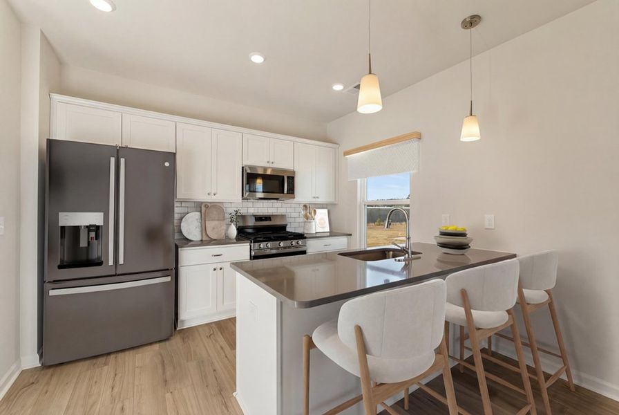 Representative furnished interior of a home built from the Barnwell - Genesis Value Collection by Mungo Homes in Golden Ridge, Youngsville (Image 3).