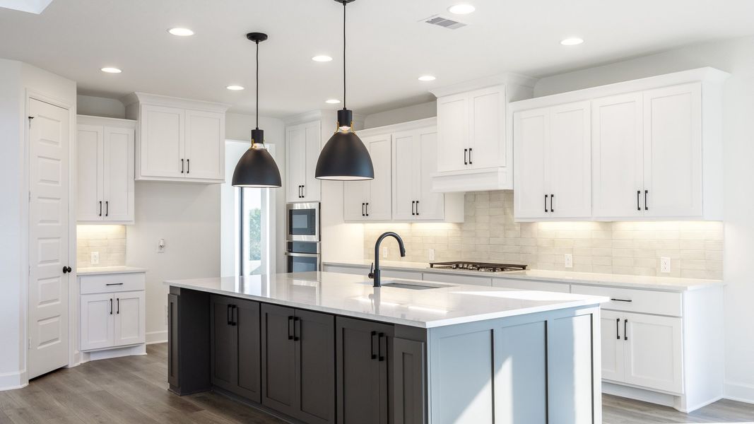 Furnished interior view inside a new home in Wolf Ranch 56', Georgetown (Image 3).
