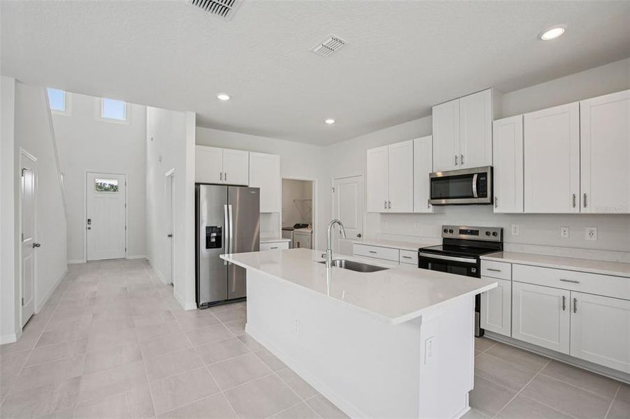 Furnished interior view inside a new home in Two Rivers - Premier Series, Zephyrhills (Image 16).