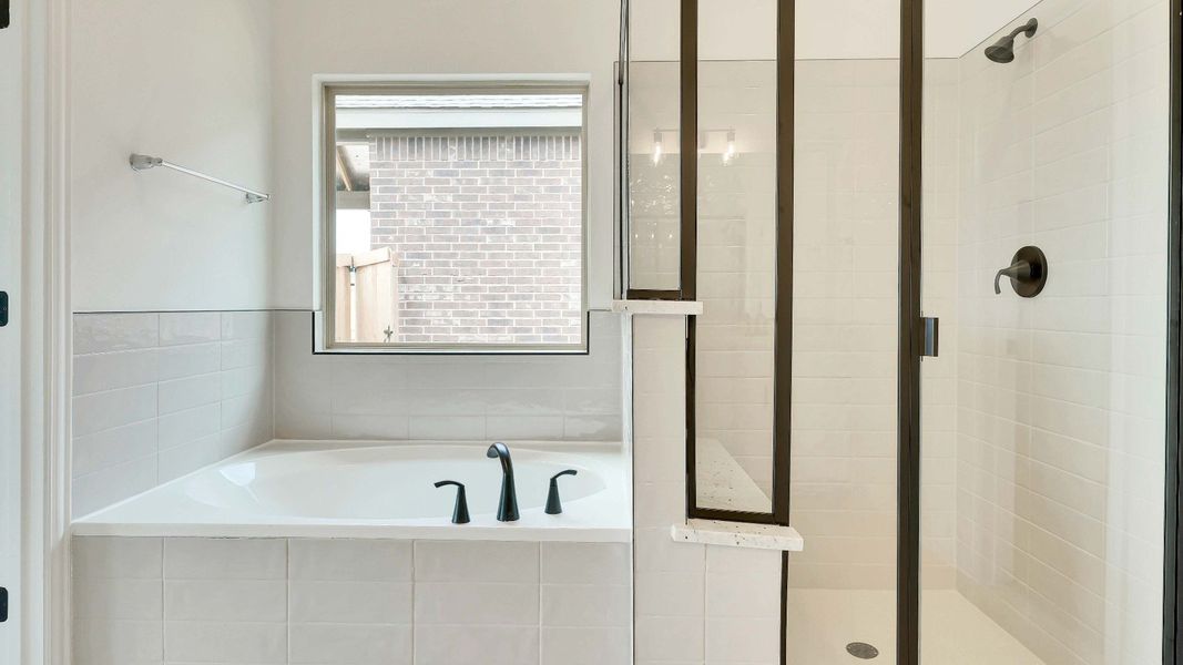 Representative furnished interior of a home built from the Palm by Brightland Homes in Sunterra, Katy (Image 10).