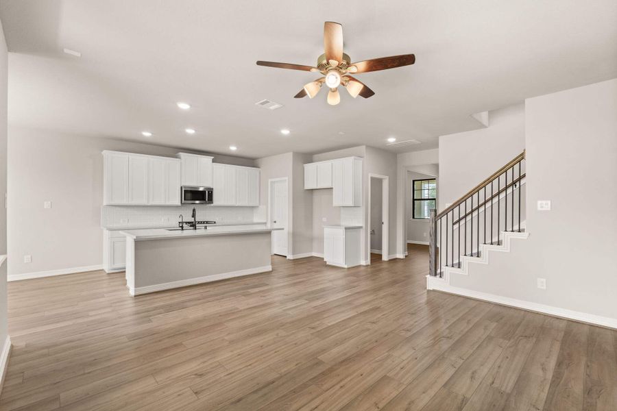 Open concept kitchen, living and dining rooms perfect for entertaining