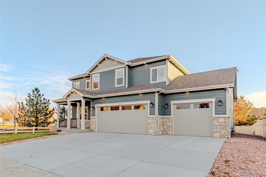 Front exterior of a new home in , Firestone, CO, highlighting curb appeal (Image 29).