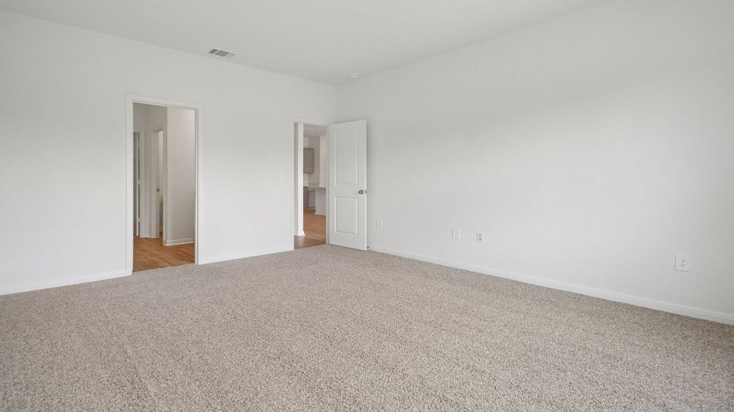 Spacious, unfurnished interior of a new home in Prairie Lakes, Buda (Image 26).