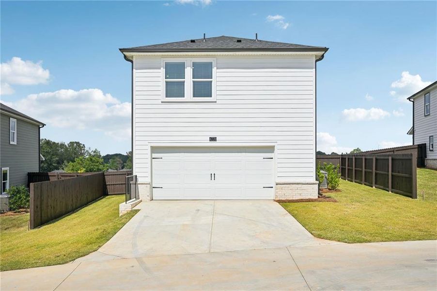 Exterior details and patio area of a home in Hemingway - Cottage Series, Cumming (Image 21).