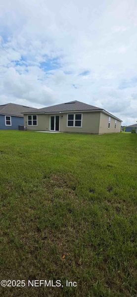 Front exterior of a new home in The Arbors, Jacksonville, FL, highlighting curb appeal (Image 26).