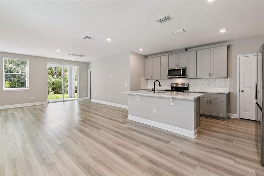 Furnished interior view inside a new home in , Daytona Beach (Image 11).