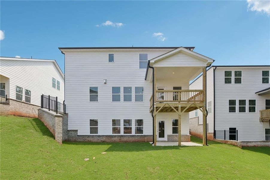 Exterior details and patio area of a home in Martin Springs - Estate Series, Lawrenceville (Image 29).