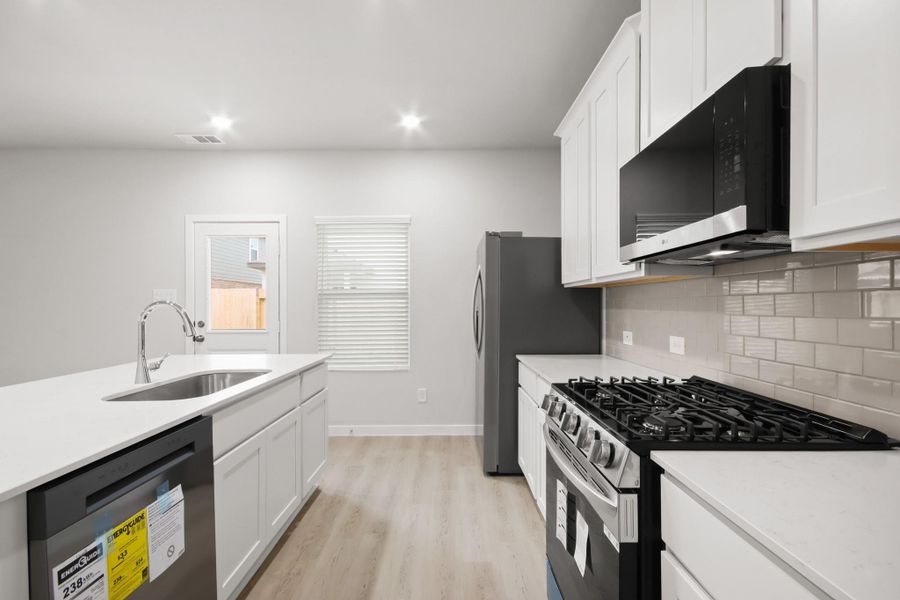 Furnished interior view inside a new home in Lakes at Black Oak, Magnolia (Image 6).