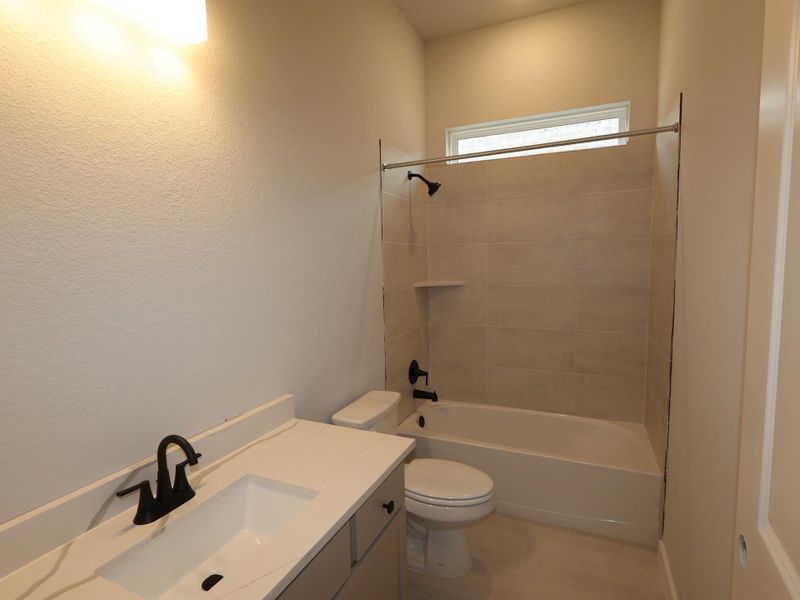 Furnished interior view inside a new home in Heritage, Dripping Springs (Image 5).