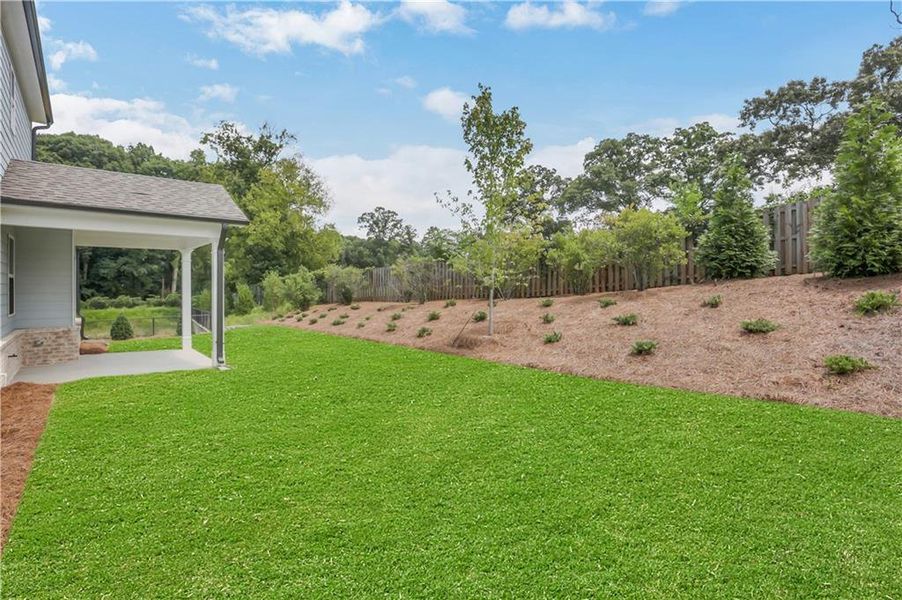 Exterior details and patio area of a home in The Paddocks at Doc Hughes, Buford (Image 27). Exterior details and patio area of a home in The Paddocks at Doc Hughes, Buford (Image 27).