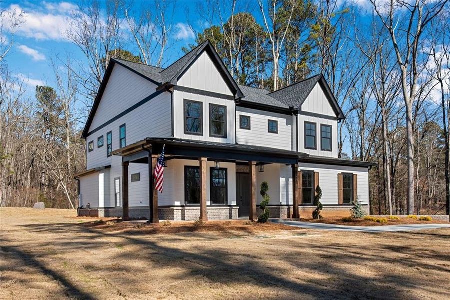 Front exterior of a new home in , Hiram, GA, highlighting curb appeal (Image 31). Front exterior of a new home in , Hiram, GA, highlighting curb appeal (Image 31).