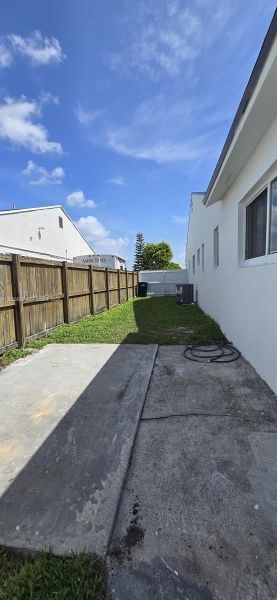 Exterior details and patio area of a home in , Miami (Image 20). Exterior details and patio area of a home in , Miami (Image 20).