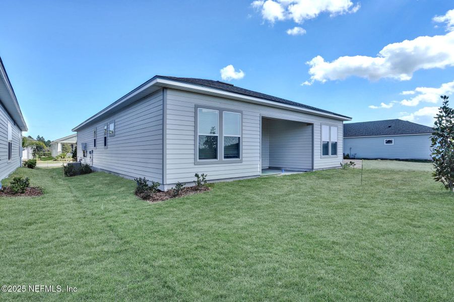 Exterior details and patio area of a home in , Palm Coast (Image 3). Exterior details and patio area of a home in , Palm Coast (Image 3).