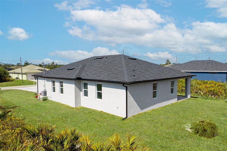 Exterior details and patio area of a home in , Rotonda West (Image 36).