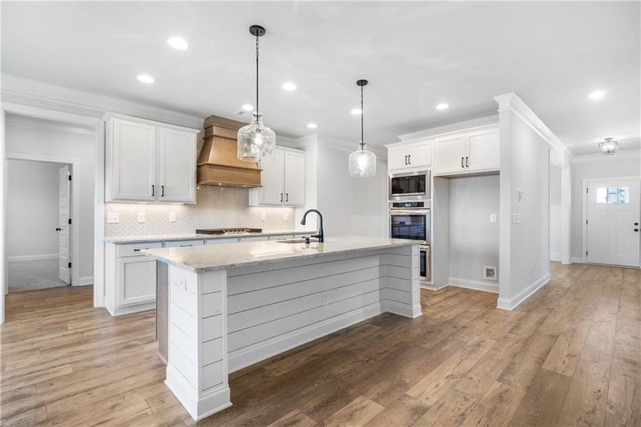 Furnished interior view inside a new home in Calgary Downs, Winder (Image 8).