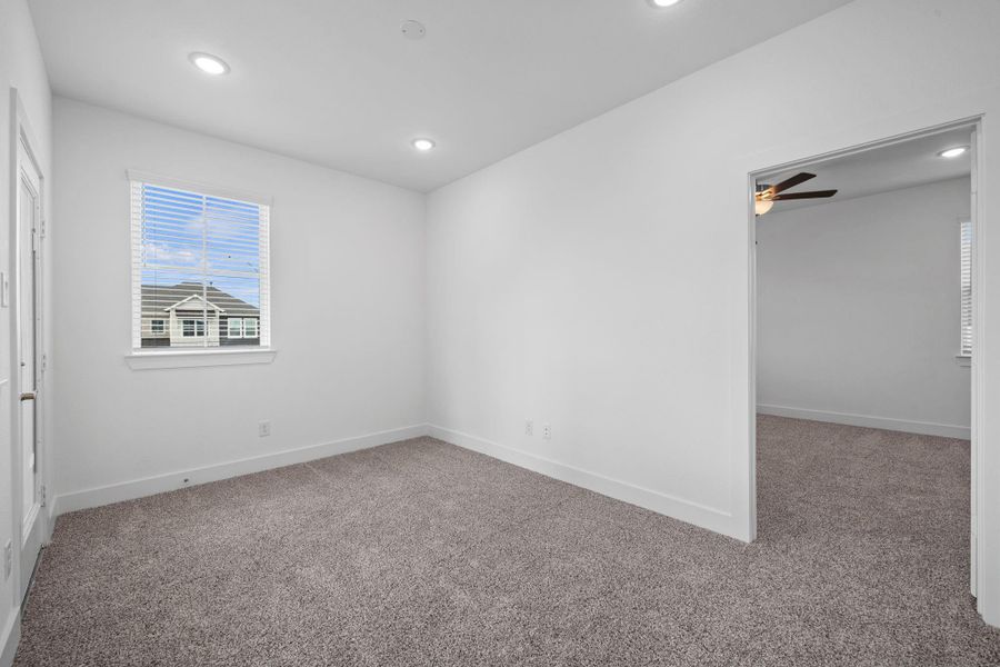 Spacious, unfurnished interior of a new home in Meridiana, Manvel (Image 24). Spacious, unfurnished interior of a new home in Meridiana, Manvel (Image 24).