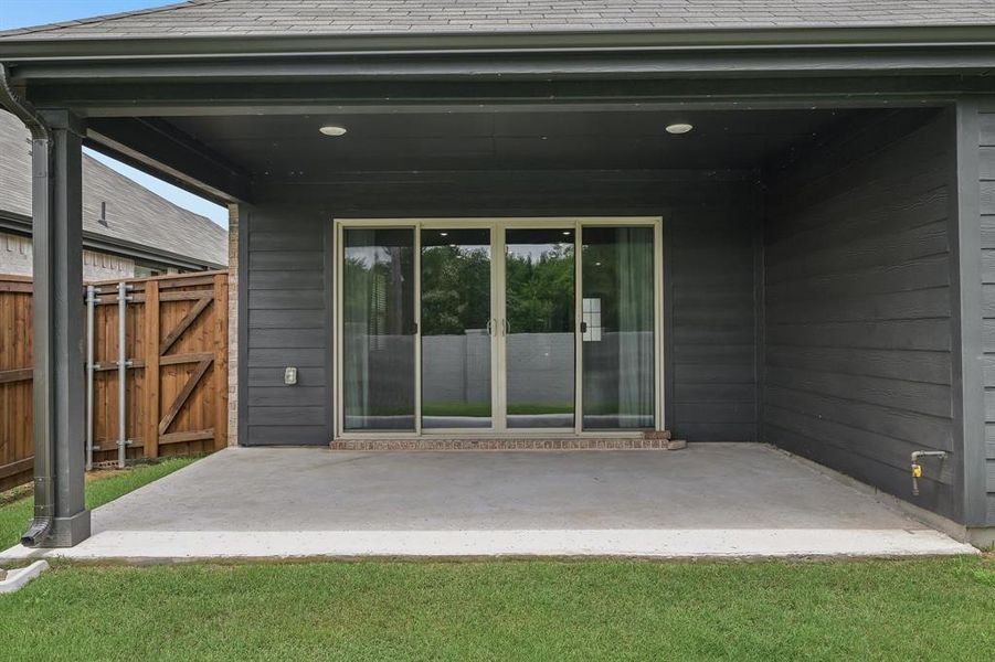 Exterior details and patio area of a home in Lakehaven - Signature Series, Farmersville (Image 25). Exterior details and patio area of a home in Lakehaven - Signature Series, Farmersville (Image 25).
