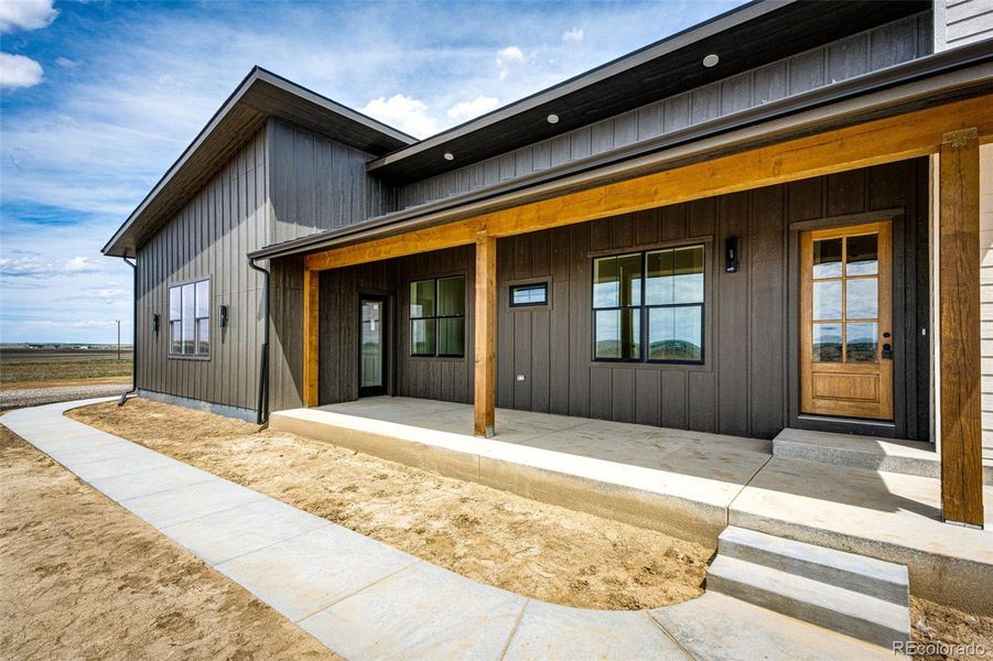 Front exterior of a new home in , Byers, CO, highlighting curb appeal (Image 1). Front exterior of a new home in , Byers, CO, highlighting curb appeal (Image 1).