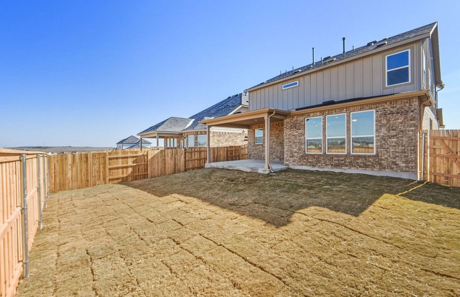 Exterior details and patio area of a home in Sunfield, Buda (Image 25).
