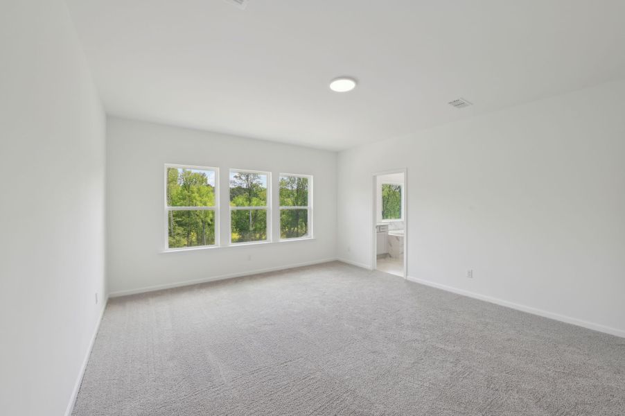 Representative unfurnished interior of a home built from the Jordan by Ashton Woods in Rowland's Grant, Fuquay Varina (Image 23).