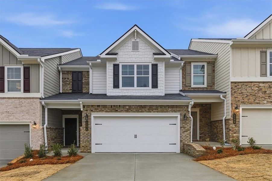 Front exterior of a new home in Park Center Pointe, Mableton, GA, highlighting curb appeal (Image 20).