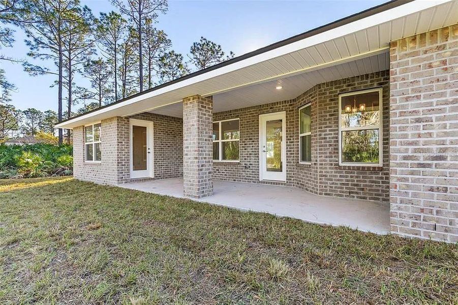 Exterior details and patio area of a home in Palm Coast, Palm Coast (Image 3). Exterior details and patio area of a home in Palm Coast, Palm Coast (Image 3).
