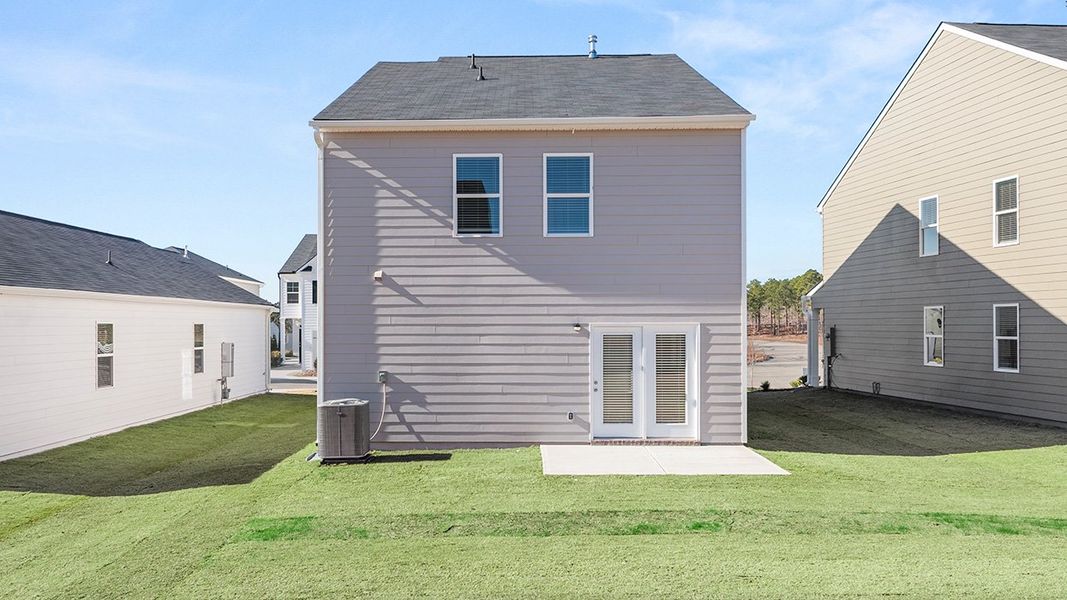 Exterior details and patio area of a home in The Abbey at Trolley Run Station, Aiken (Image 2).