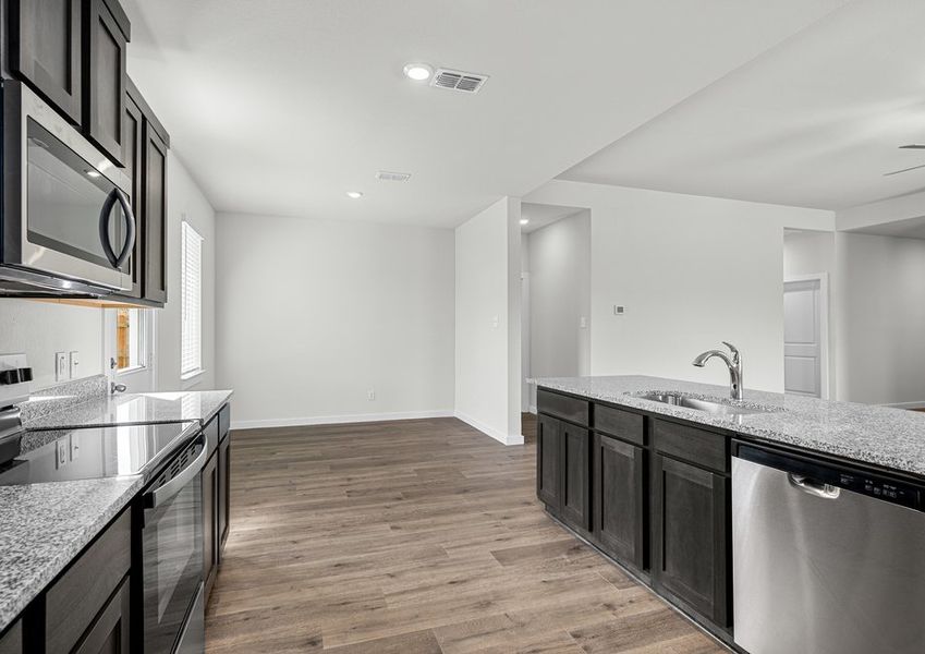 The dining room sits right off of the kitchen.