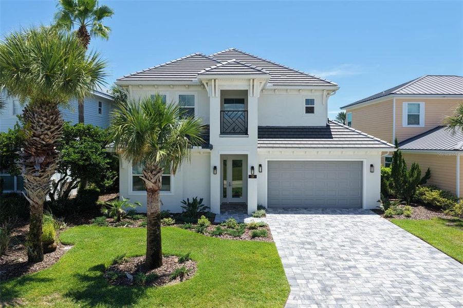 Front exterior of a new home in , Palm Coast, FL, highlighting curb appeal (Image 28). Front exterior of a new home in , Palm Coast, FL, highlighting curb appeal (Image 28).