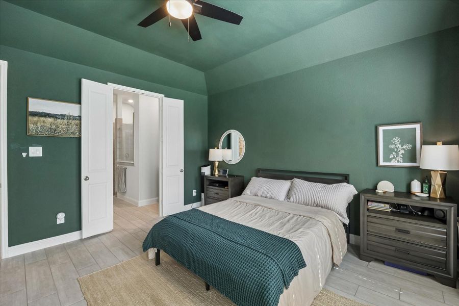 Another view of the generous primary bedroom, highlighting its layout and bright atmosphere. Another view of the generous primary bedroom, highlighting its layout and bright atmosphere.