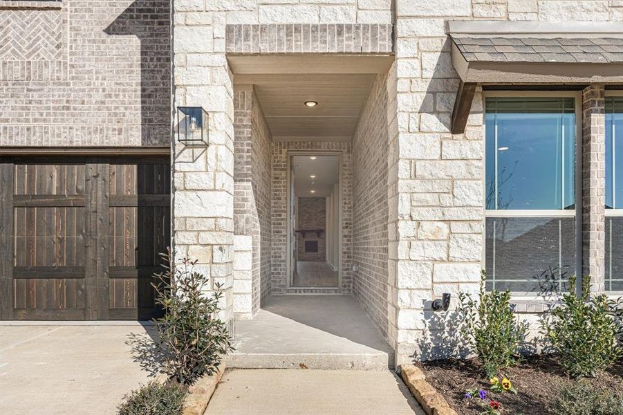 Exterior details and patio area of a home in The Grove, Midlothian (Image 4).