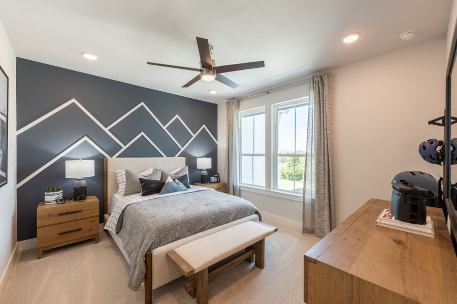 Representative furnished interior of a home built from the Woodbridge by Tri Pointe Homes in Bridgeland, Cypress (Image 36).