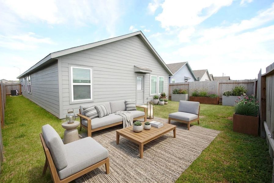 Exterior details and patio area of a home in Wharton Lakes, Wharton (Image 3).