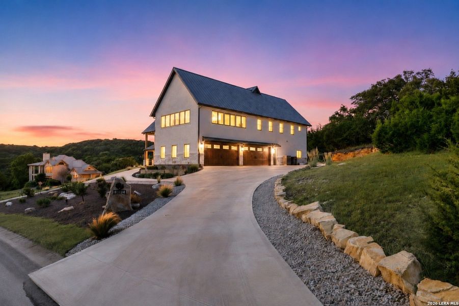 Front exterior of a new home in , Boerne, TX, highlighting curb appeal (Image 26). Front exterior of a new home in , Boerne, TX, highlighting curb appeal (Image 26).