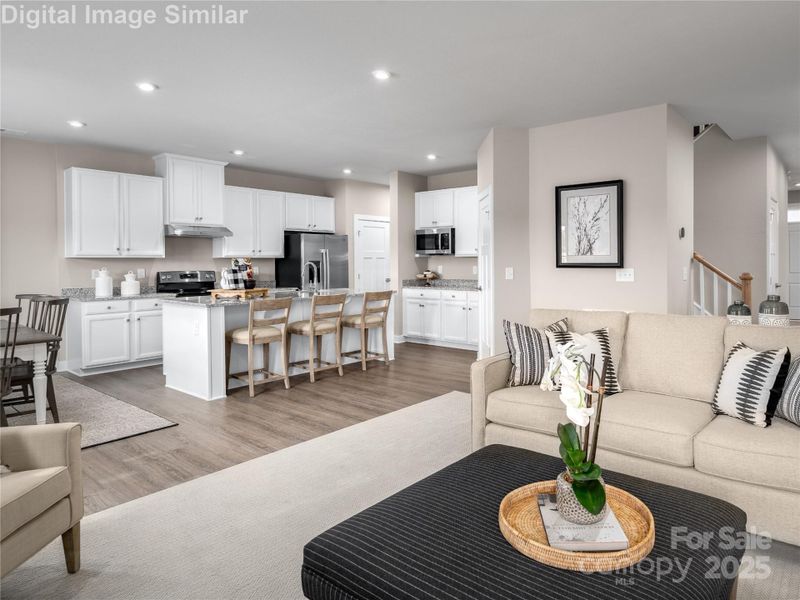 With an open floor plan that connects every space, you’ll never miss a laugh, a story, or a toast — enjoy the get-together! With an open floor plan that connects every space, you’ll never miss a laugh, a story, or a toast — enjoy the get-together!