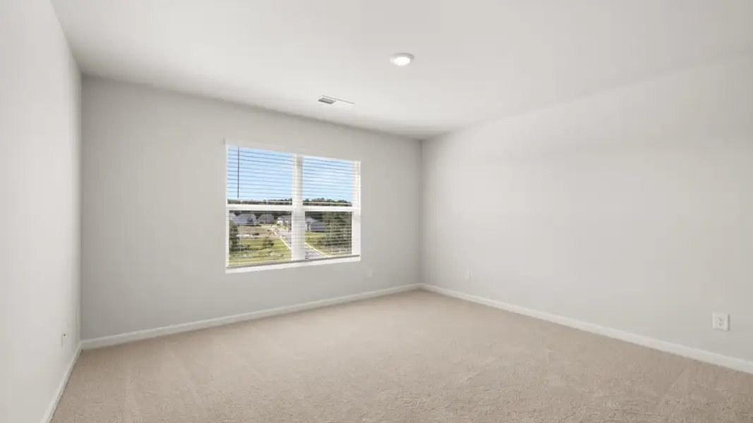 Representative unfurnished interior of a home built from the Pattison by D.R. Horton in Branford Crossing, Stockbridge (Image 14).