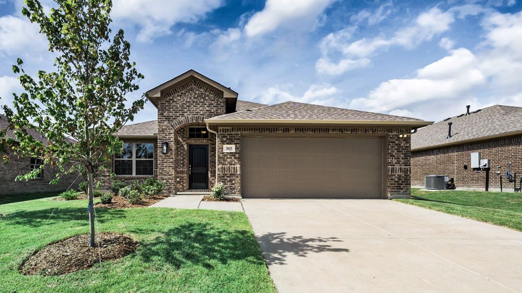 Front exterior of a new home in Fox Landing, Caddo Mills, TX, highlighting curb appeal (Image 1). Front exterior of a new home in Fox Landing, Caddo Mills, TX, highlighting curb appeal (Image 1).