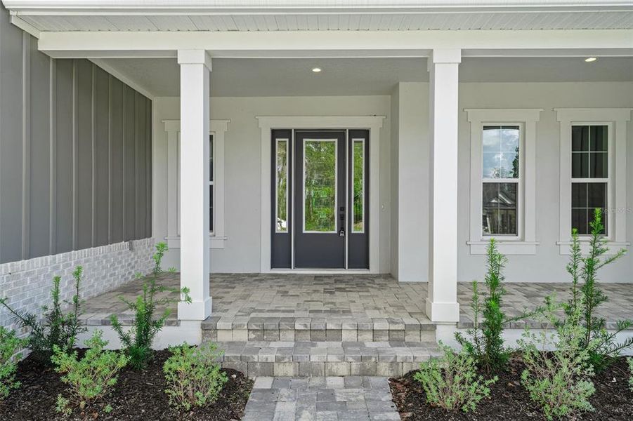 Front exterior of a new home in , Brooksville, FL, highlighting curb appeal (Image 24).
