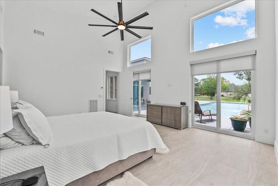 The 20 x16 primary suite features oversized sliding glass doors and clerestory windows that offer breathtaking views.