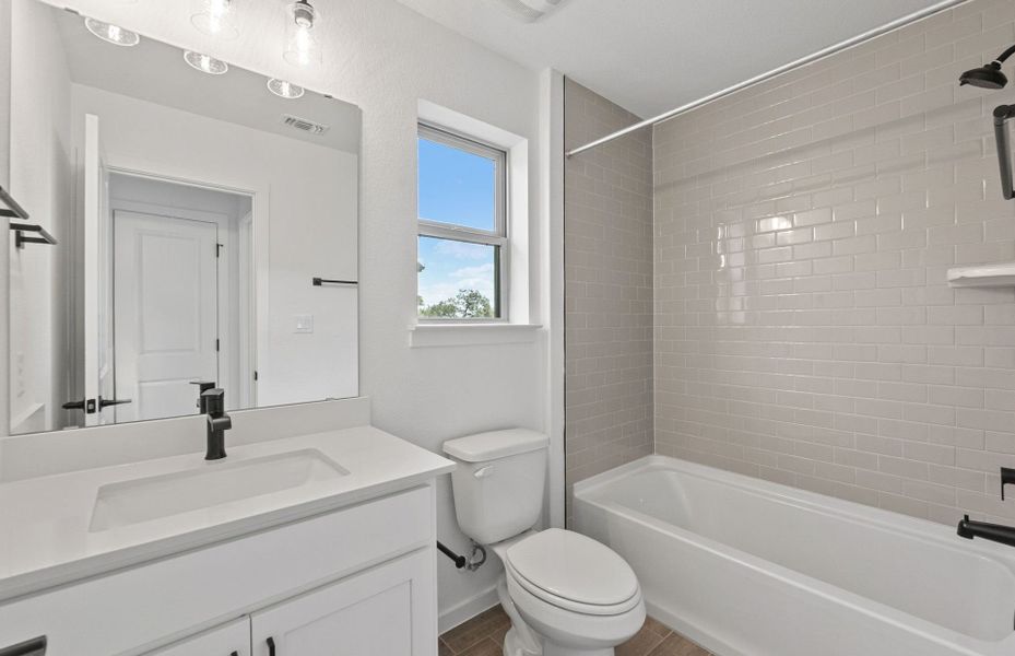 Furnished interior view inside a new home in Wolf Ranch, Georgetown (Image 12).