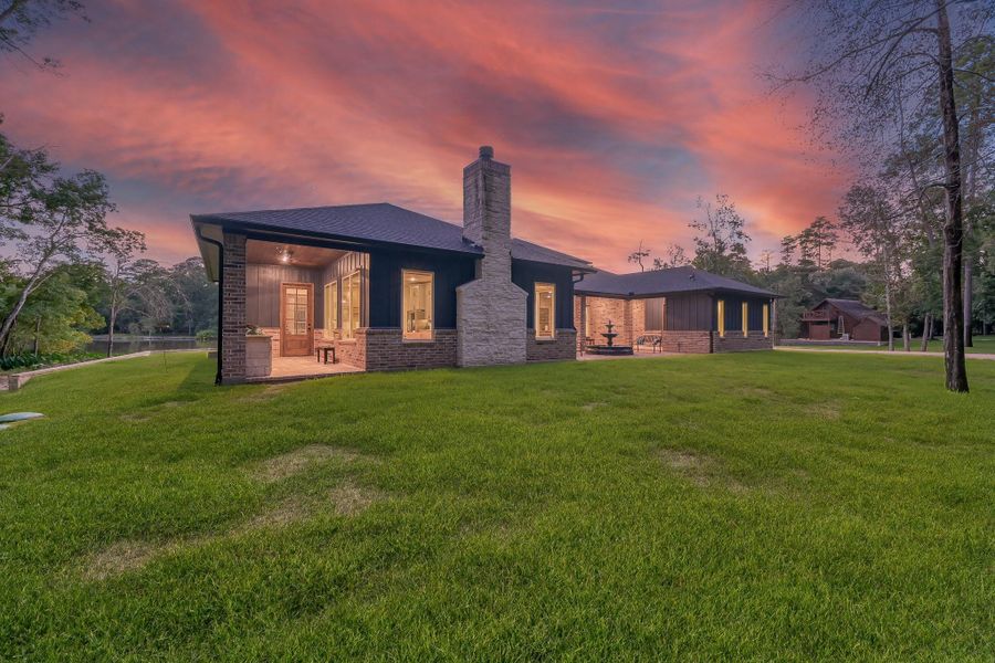 Outdoor kitchen offers both gas and charcoal option grills for the cooking enthusiast.