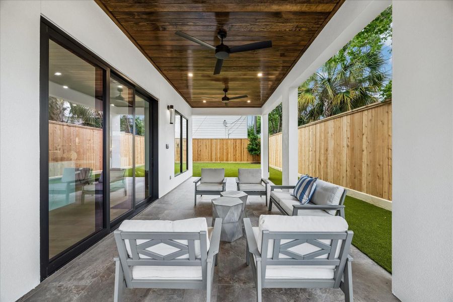 Exterior details and patio area of a home in , Houston (Image 24).