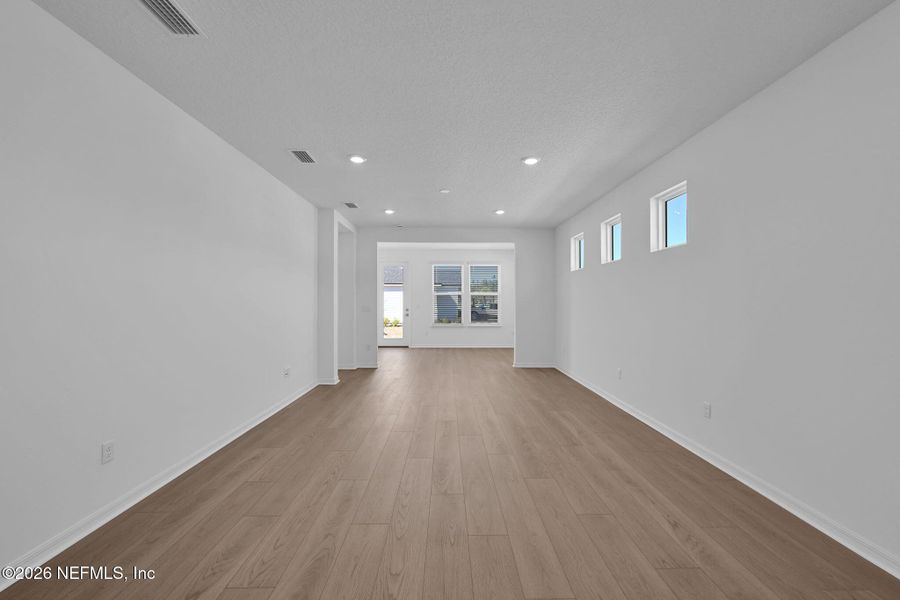 Spacious, unfurnished interior of a new home in Del Webb Wildlight, Yulee (Image 13).