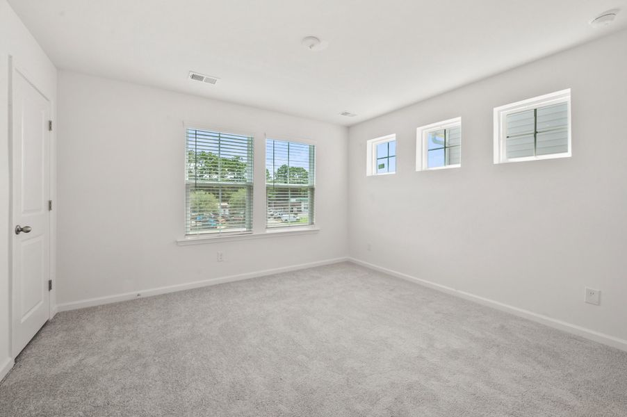 Spacious, unfurnished interior of a new home in Clear Springs Townhomes, North Charleston (Image 21).