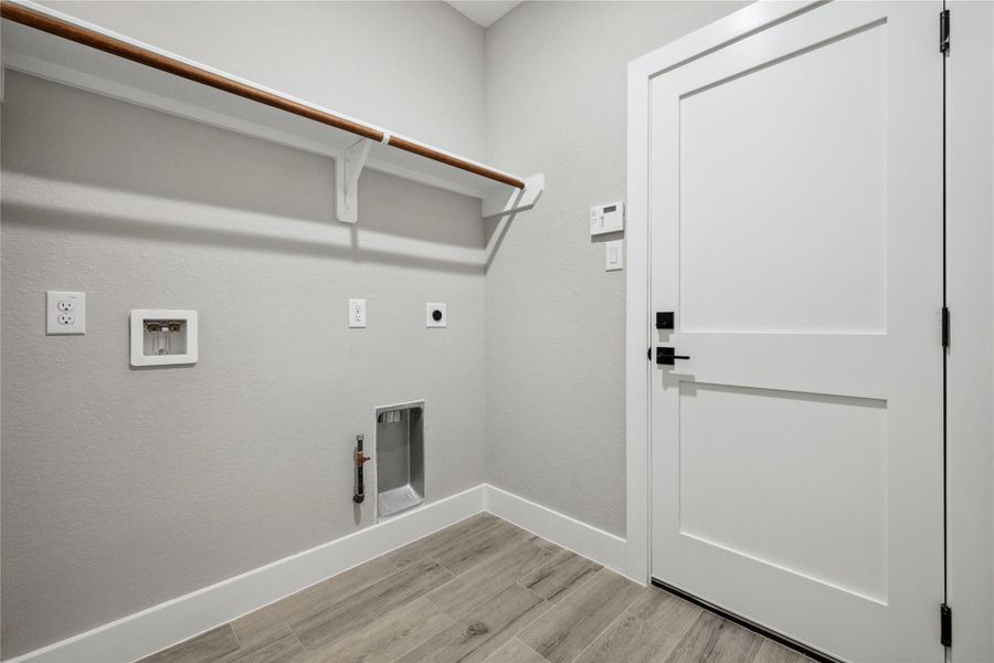 Laundry. Home is plumbed for gas.