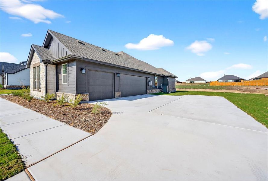 Front exterior of a new home in Fairview Meadows, New Fairview, TX, highlighting curb appeal (Image 18). Front exterior of a new home in Fairview Meadows, New Fairview, TX, highlighting curb appeal (Image 18).