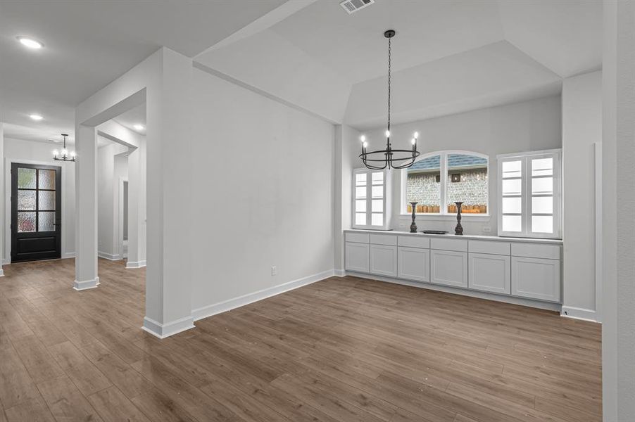 EXAMPLE PHOTO: You will love entertaining family and friends here!  High ceilings, vinyl plank floors