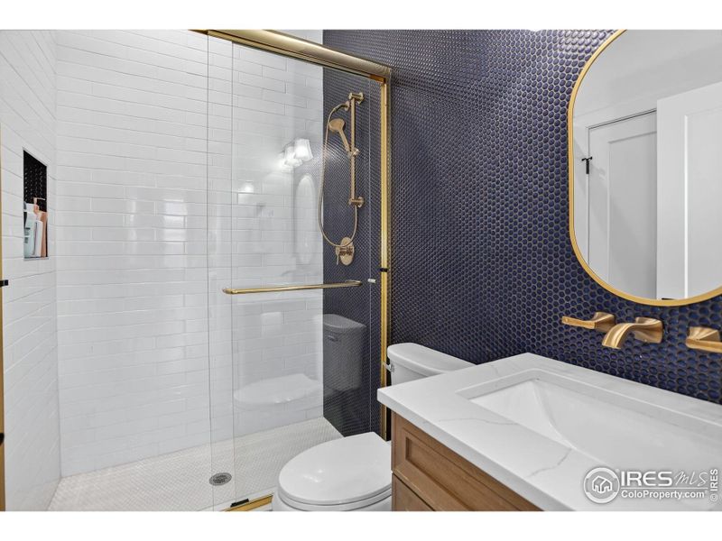 This main floor includes a large. well-appointed Jack and Jill bathroom, directly accessible from two separate bedrooms. This main floor includes a large. well-appointed Jack and Jill bathroom, directly accessible from two separate bedrooms.